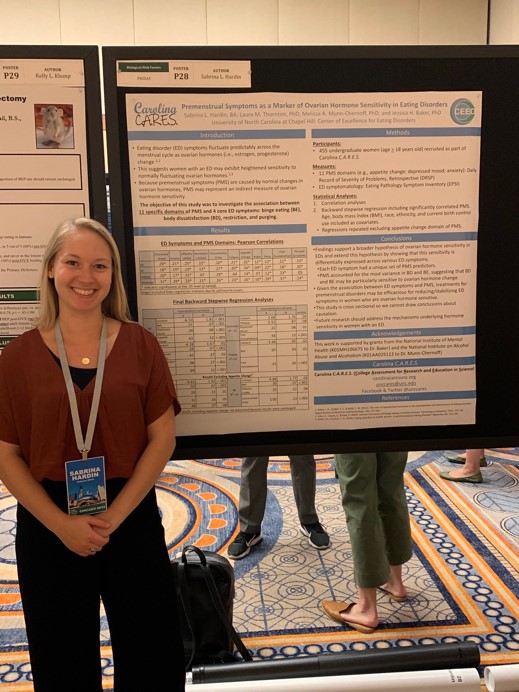 A group of people posing for the camera

Description automatically generated